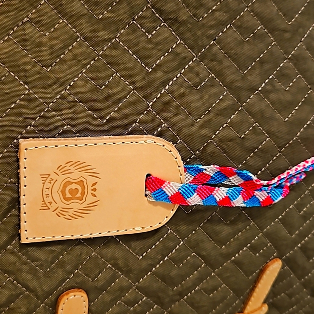 Consuela key chain or tag